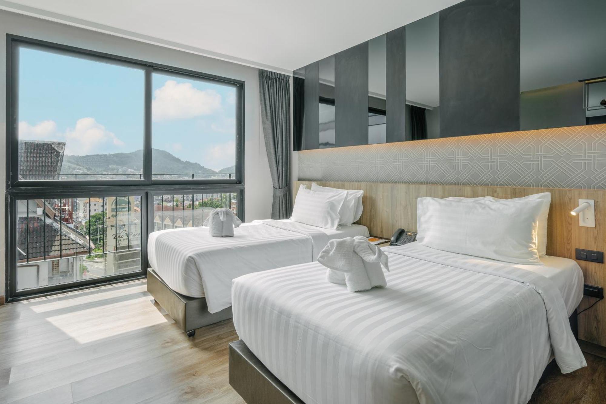 Rak Elegant Hotel Patong Exterior foto