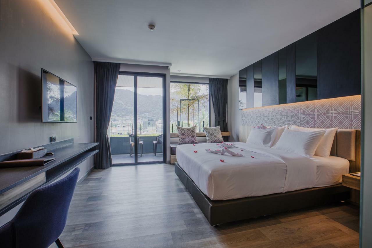 Rak Elegant Hotel Patong Exterior foto